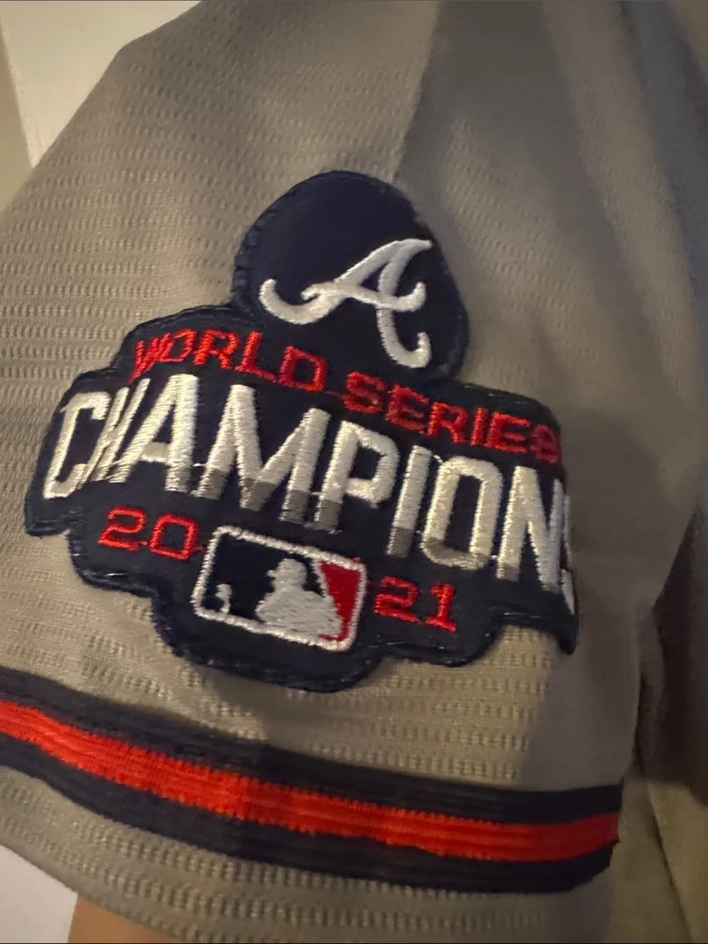 Nike Gray Atlanta Kids Baseball Jersey with Red and Black Trim